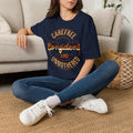 Unbothered Statement Unisex Softstyle Tee – Navy & Earth Tones